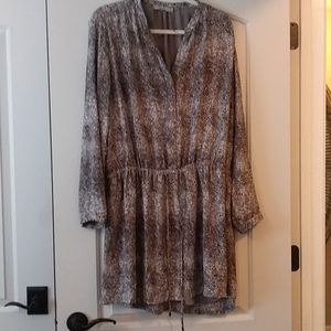 Long sleeve, snake skin, draw string dress.